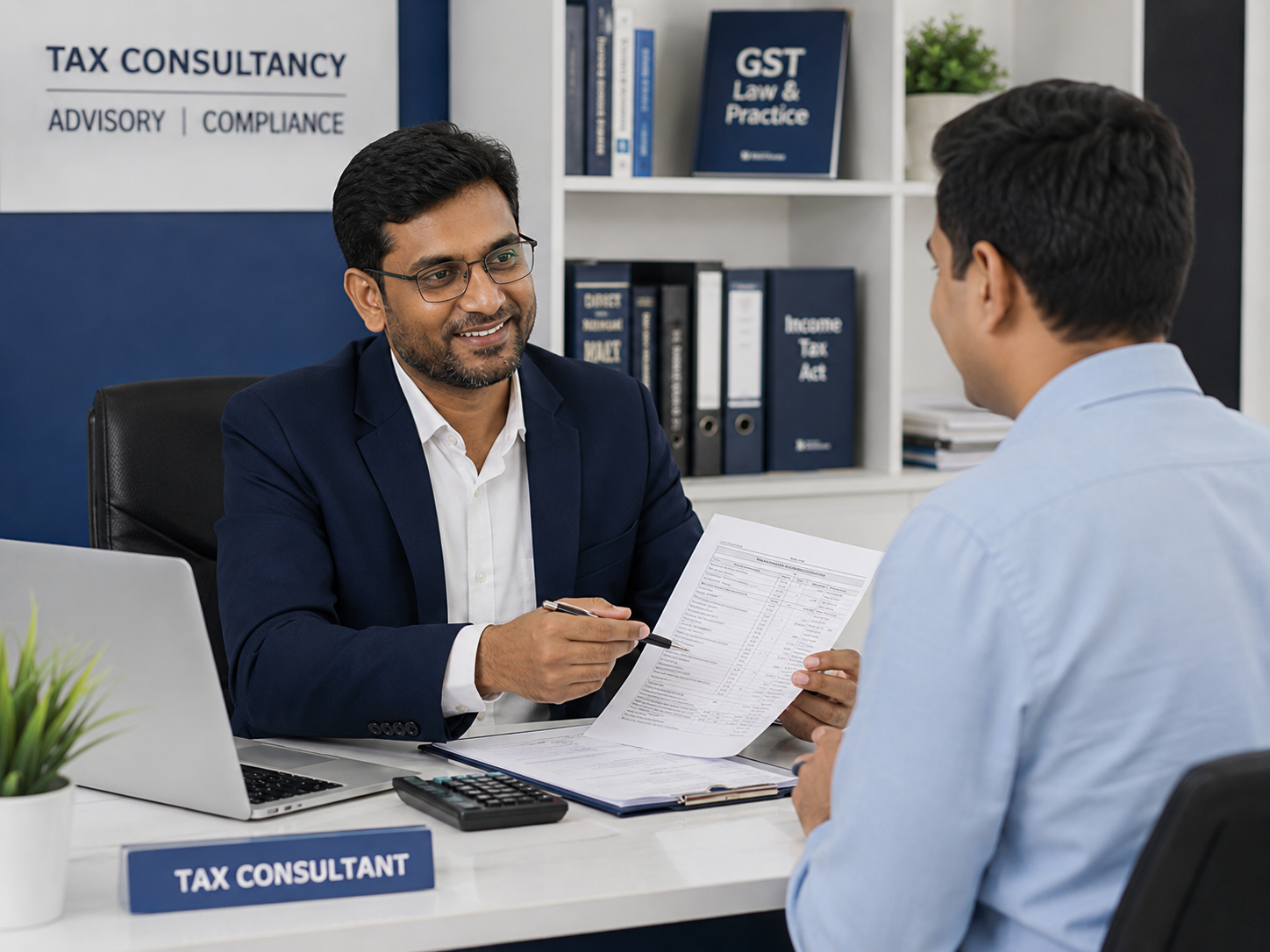 HATS consultant reviewing tax and GST documents with a client